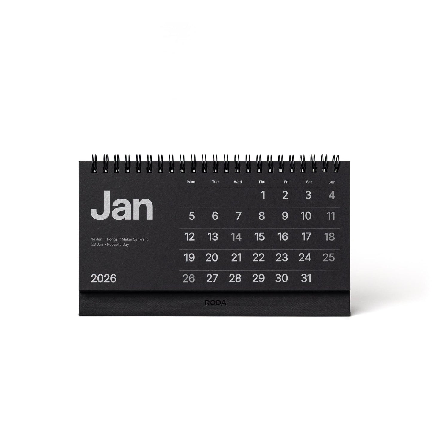 Black desk calendar for January 2026